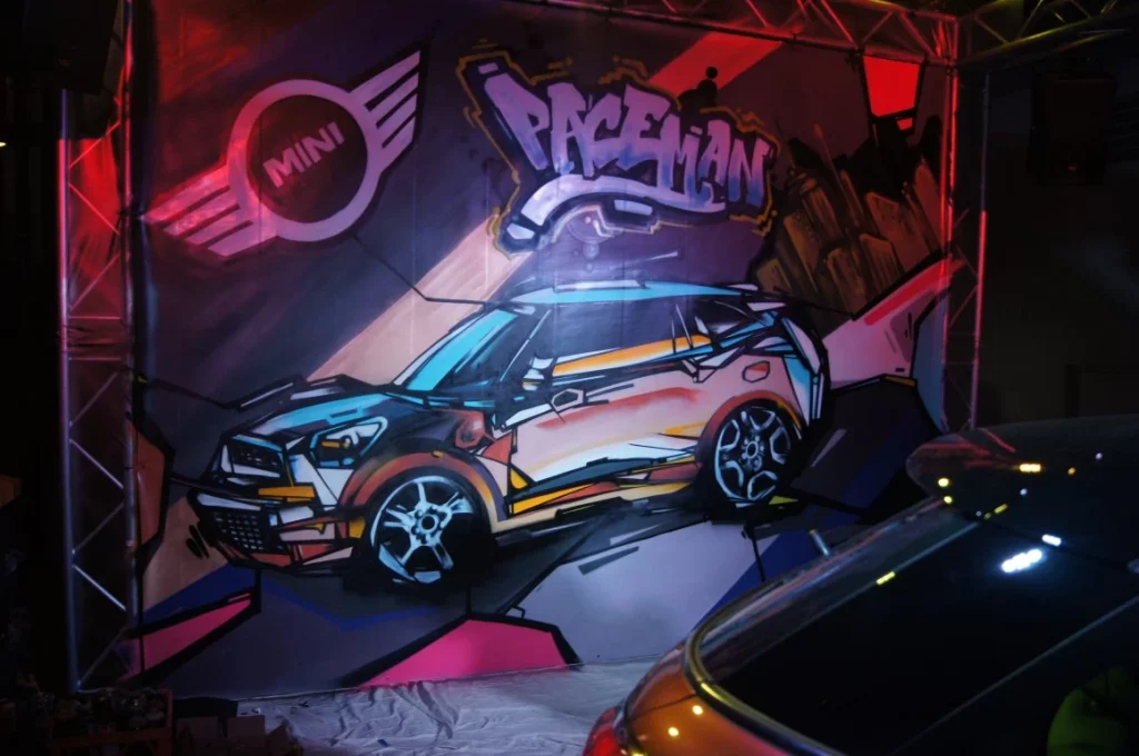 Live mural done for BMW, Adelaide. Image Source - Street Art Studios