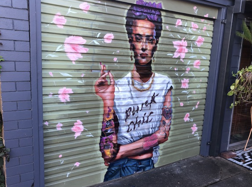 punk chic Frida Kahlo mural on corrugated garage door