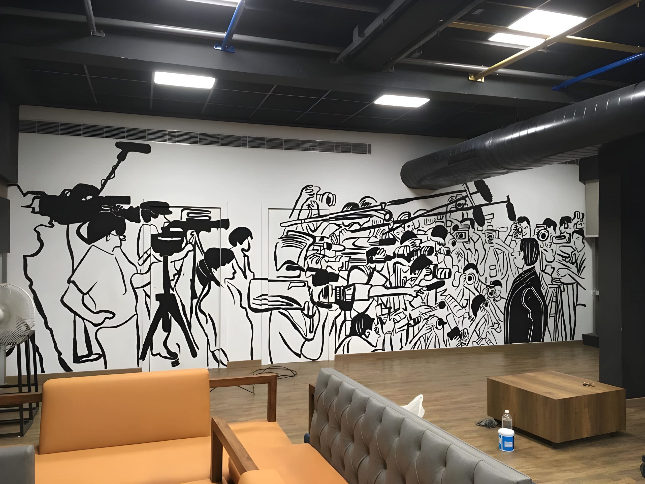 Office Creativity Art mural at a media office depicting paparazzi and political journalism, inspiring workspace creativity